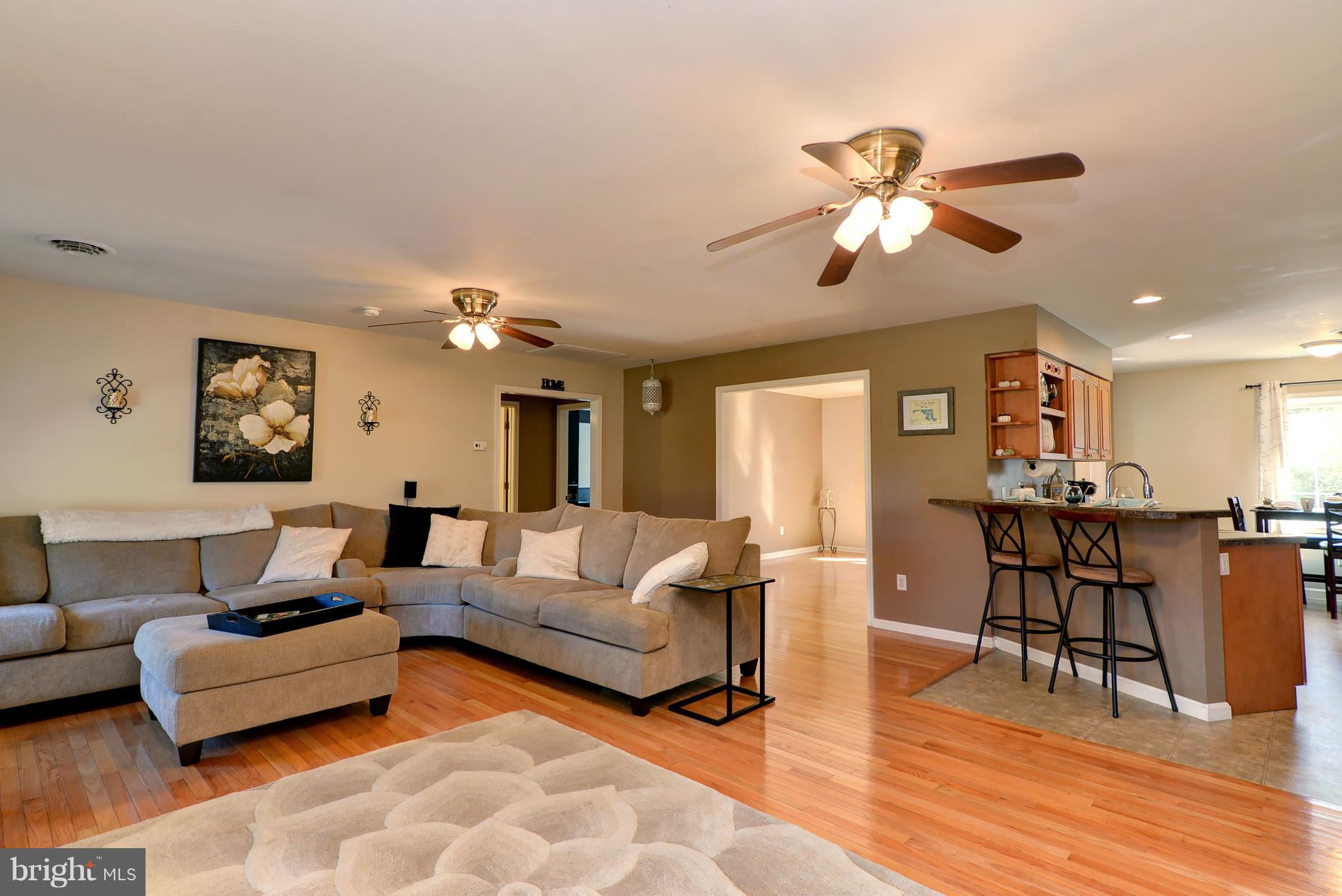 6025 Cokesbury Road Rhodesdale, MD 21659 - Photo 3 of 35 Living Room to Kitchen and Dining room