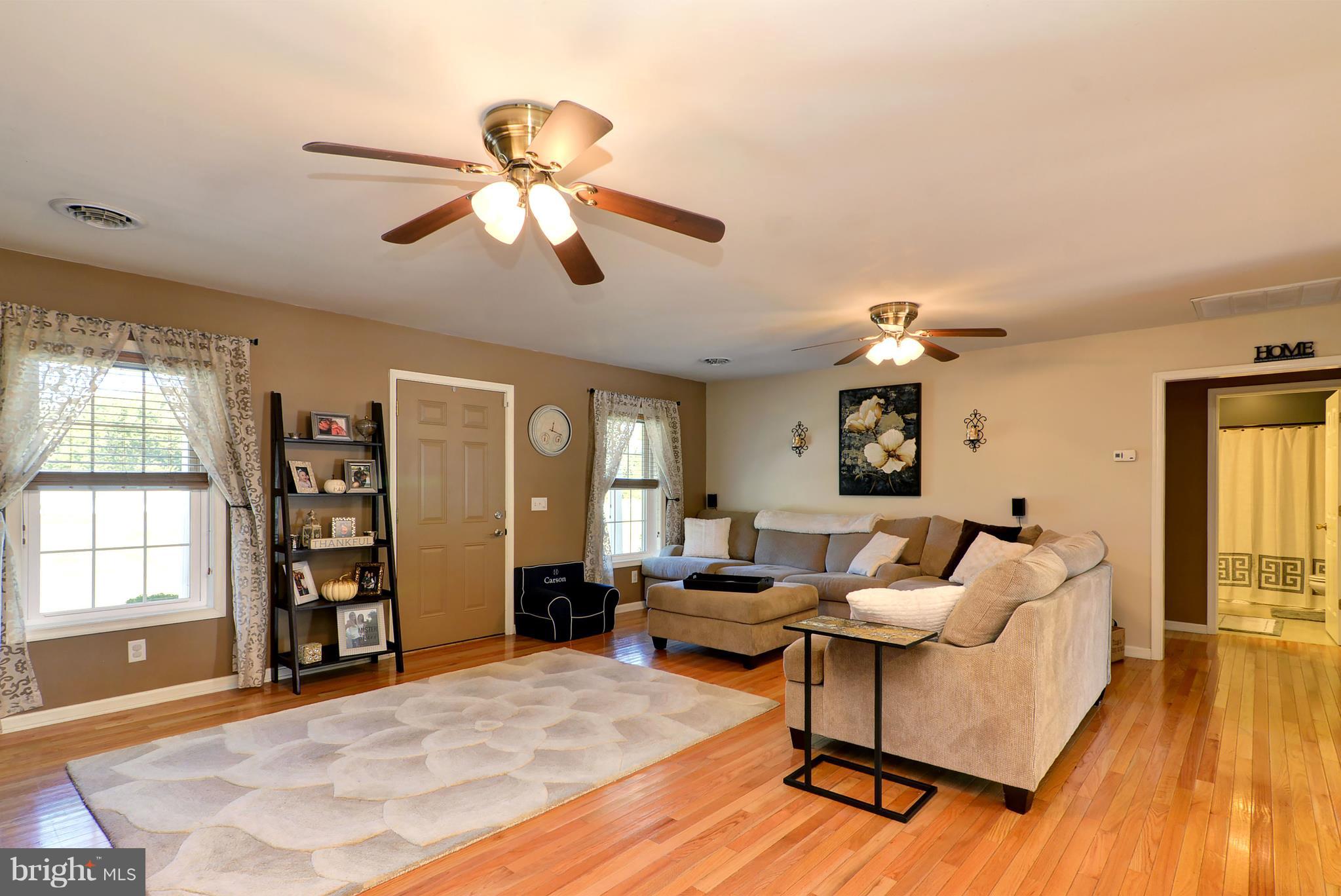 6025 Cokesbury Road Rhodesdale, MD 21659 - Photo 6 of 35 Living room entrance to hallway