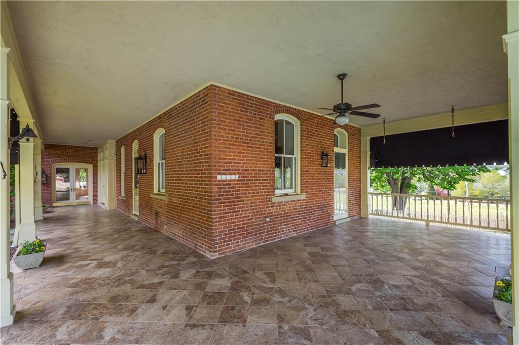 571 West McMurray Road Canonsburg, PA 15317 - Photo 36 of 47 What an amazing space. Spend the spring, summer, and fall enjoying this covered wrap around porch with awning and ceiling fan.