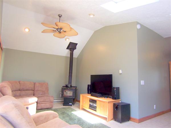 38 Granger Street Springfield, MA 01119 - Photo 12 of 30 a living room with furniture and a flat screen tv