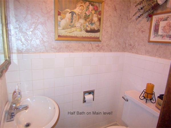38 Granger Street Springfield, MA 01119 - Photo 16 of 30 a bathroom with a sink and a mirror