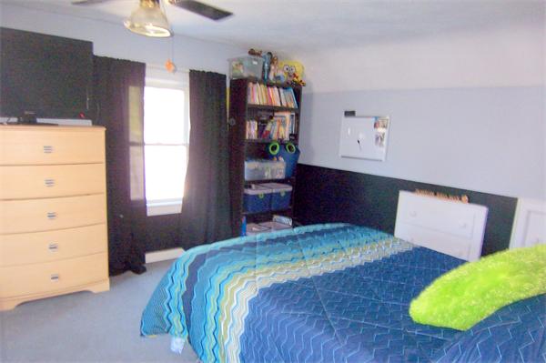 38 Granger Street Springfield, MA 01119 - Photo 21 of 30 a bedroom with a bed and a dresser