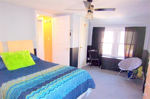 38 Granger Street Springfield, MA 01119 - Photo 22 of 30 a bedroom with a bed chair and a window