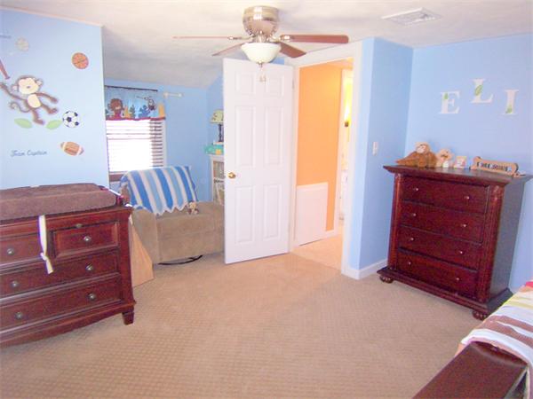 38 Granger Street Springfield, MA 01119 - Photo 25 of 30 a bed room with a bed and a dresser