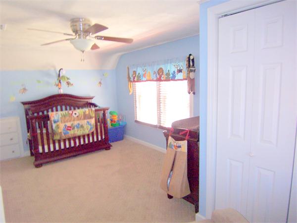38 Granger Street Springfield, MA 01119 - Photo 26 of 30 a bedroom with furniture and a window