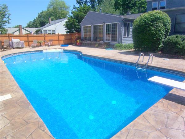 38 Granger Street Springfield, MA 01119 - Photo 9 of 30 a view of a house with pool and chairs