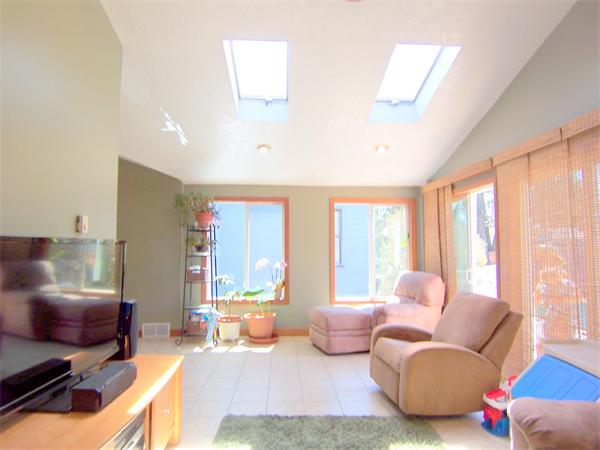 38 Granger Street Springfield, MA 01119 - Photo 10 of 30 a living room with furniture and a large window