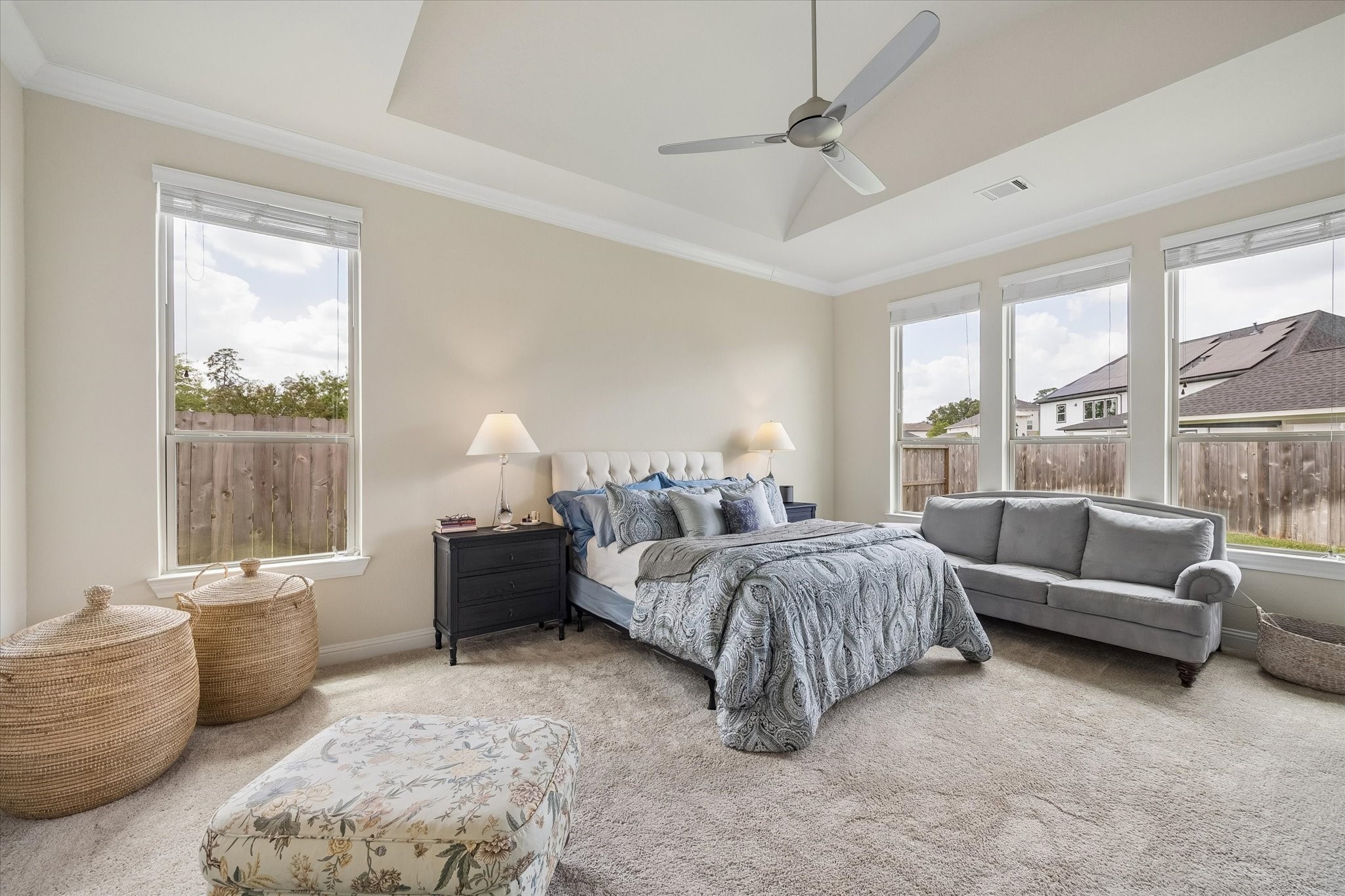 7418 Kearney Hill Lane Spring, TX 77389 - Photo 11 of 35 The spacious primary bedroom is tucked away from the remainder of the home for the utmost privacy. Expansive windows bring in an abundance of natural light!