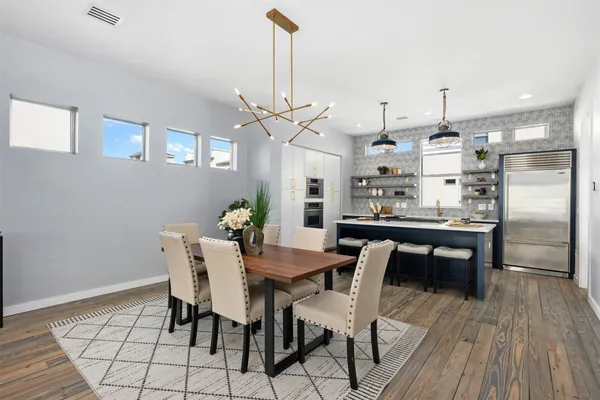 a view of a dining room with furniture