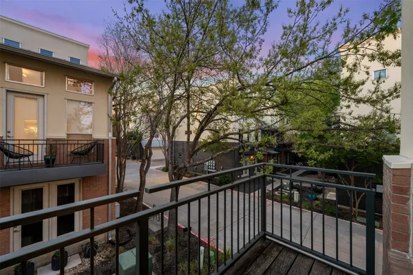 a view of balcony with furniture