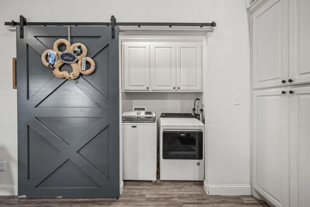 a utility room with dryer and washer