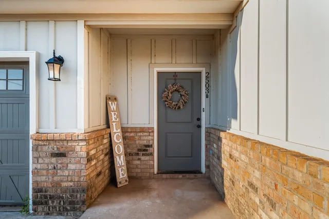 a view of front door with hallway
