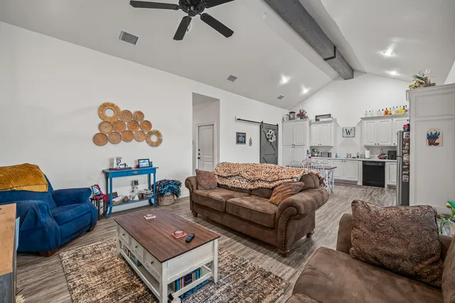 a living room with furniture and a couch