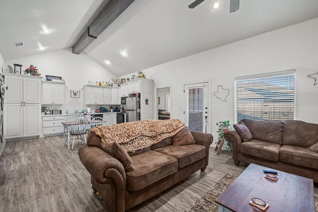 a living room with furniture and a couch