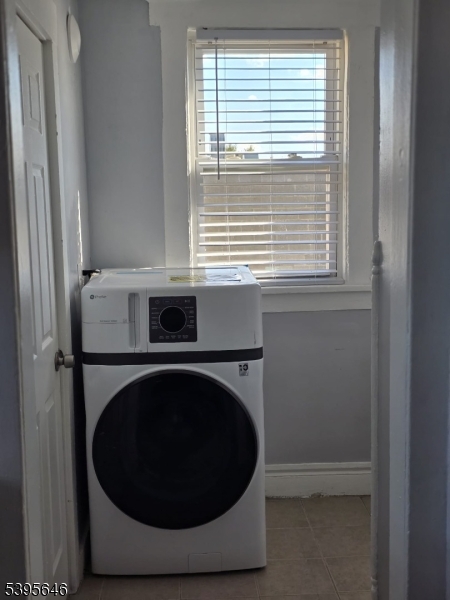 846 Market Street Paterson, NJ 07513 - Photo 8 of 11 a utility room with dryer and washer