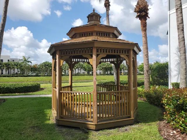 a car parked in front of white house