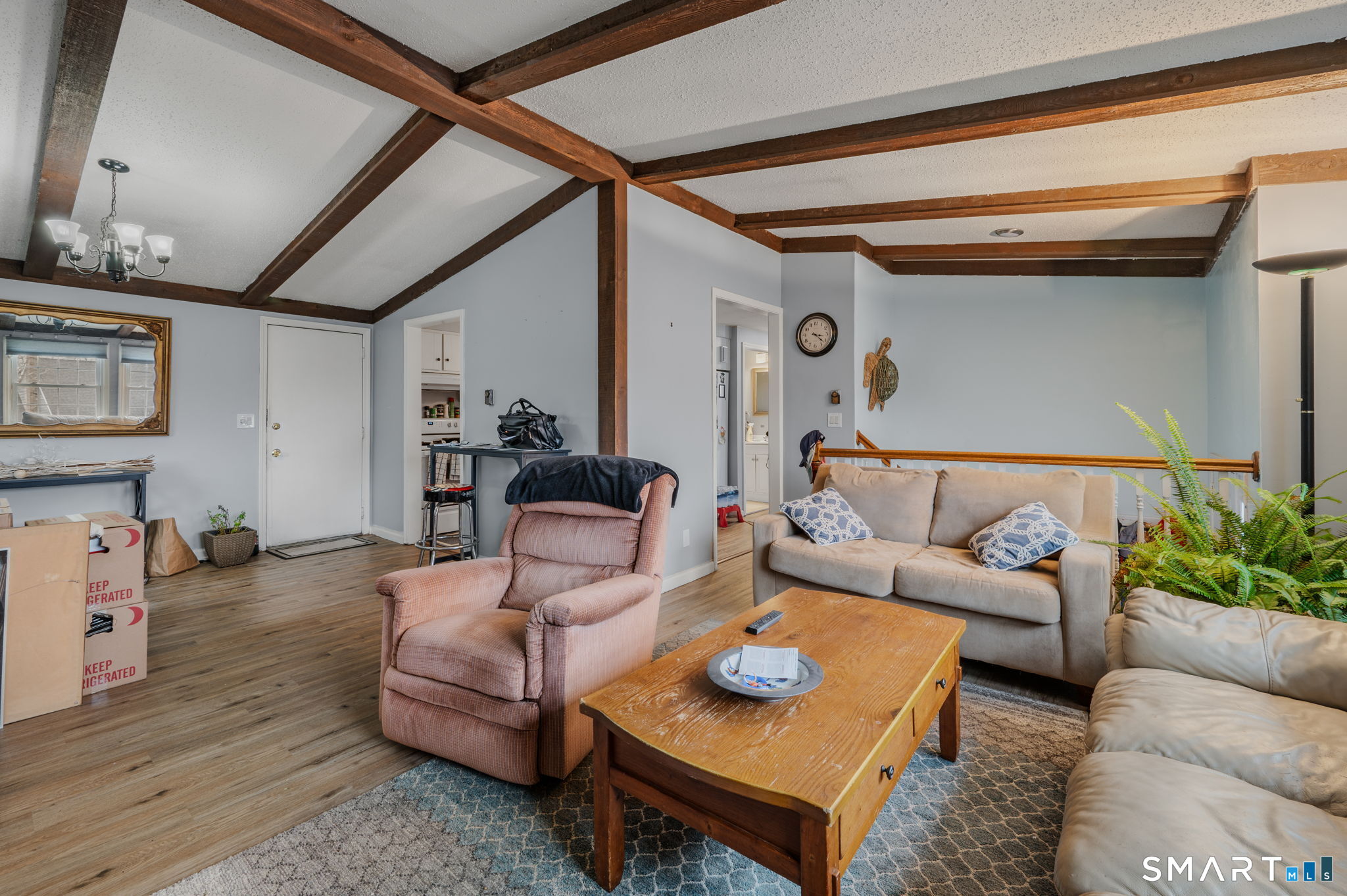 10 Amherst Court Groton, CT 06355 - Photo 14 of 25 a living room with furniture and wooden floor