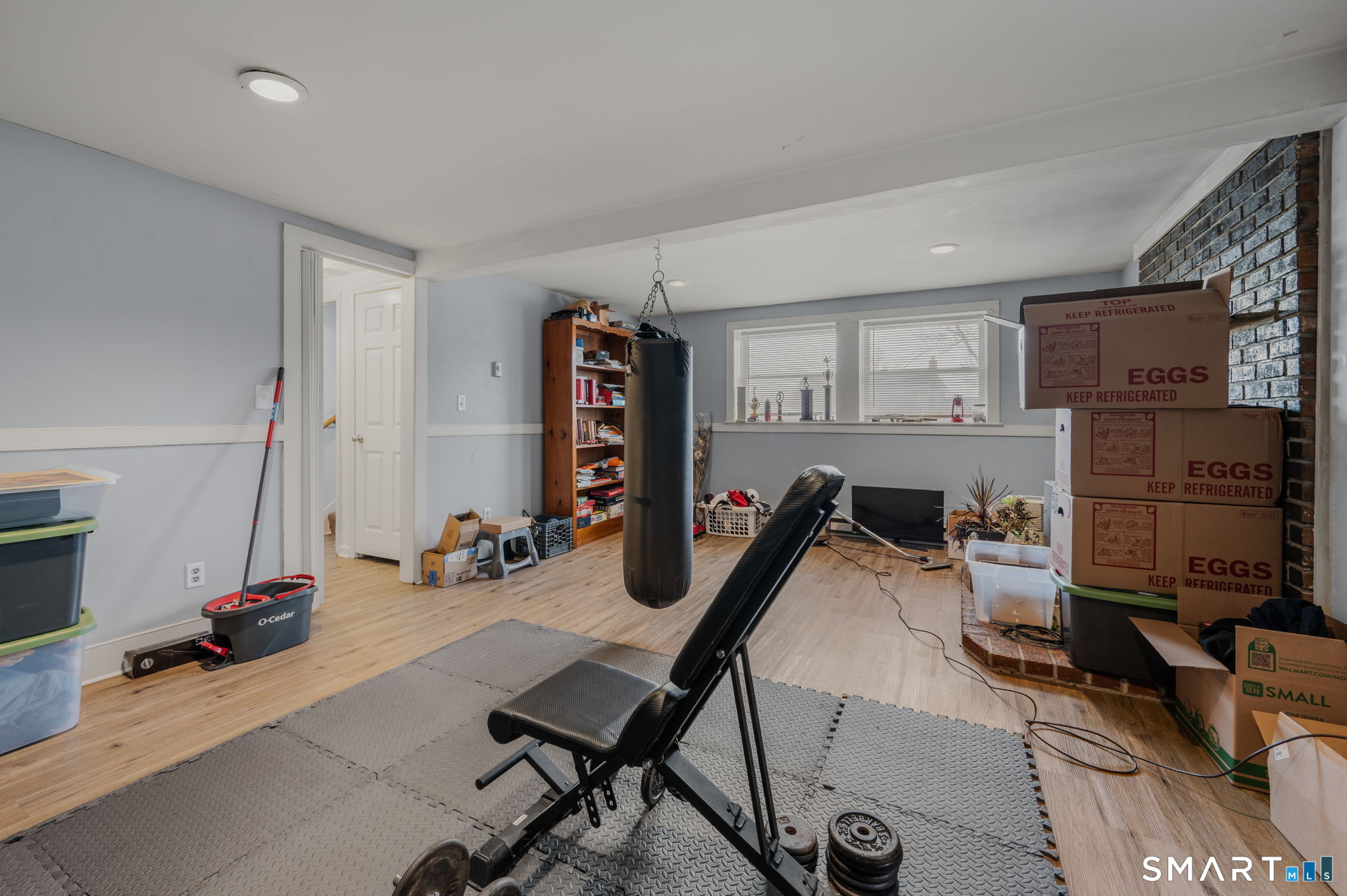10 Amherst Court Groton, CT 06355 - Photo 22 of 25 a room with furniture a flat screen tv and a window