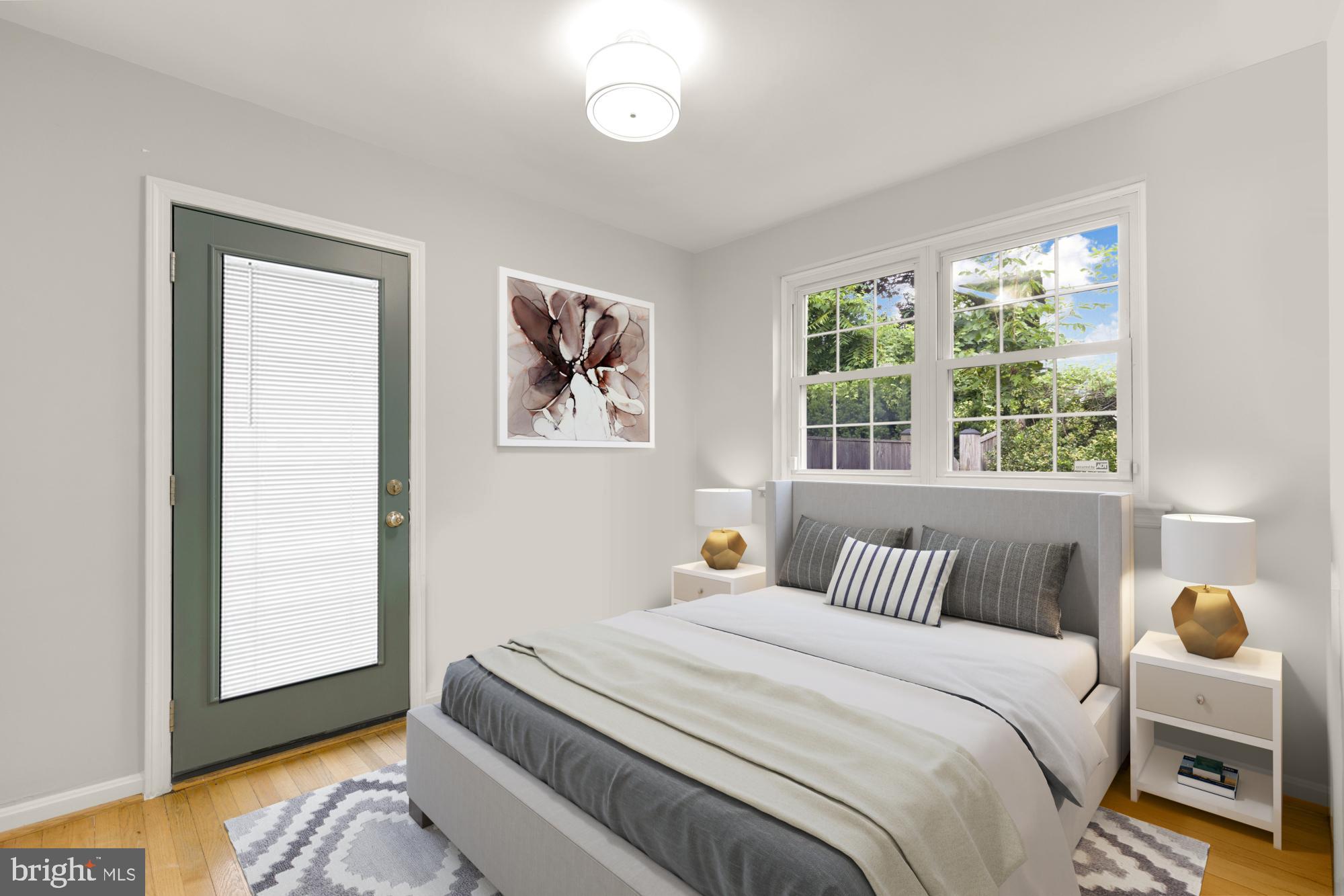 2611 Ross Road Chevy Chase, MD 20815 - Photo 22 of 37 a bedroom with a bed and a window
