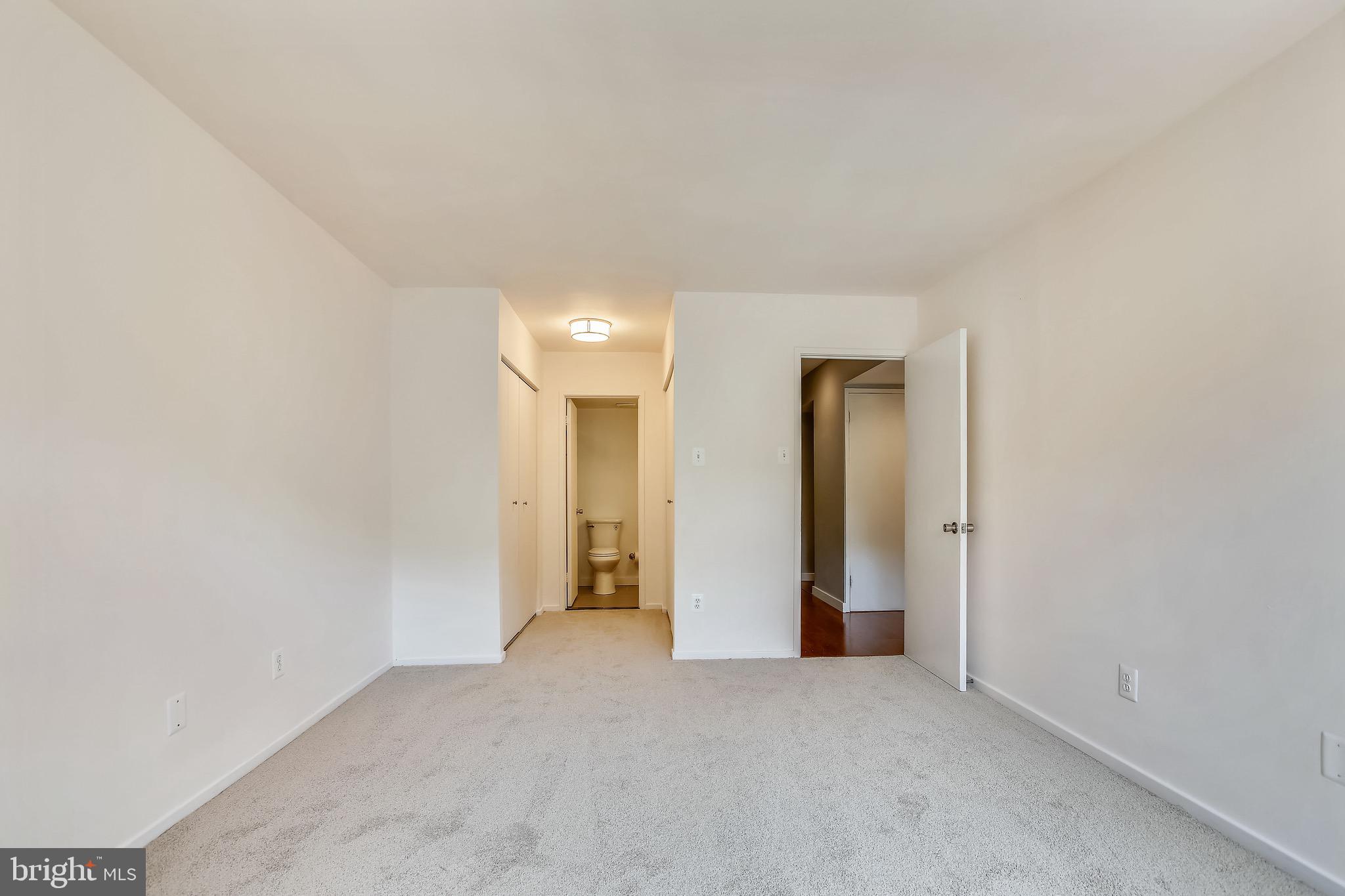 1663 Parkcrest Circle, Unit 100 Reston, VA 20190 - Photo 21 of 32 Primary Bedroom