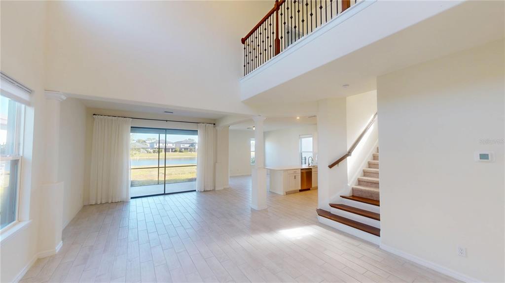 5521 Summit Glen Bradenton, FL 34203 - Photo 17 of 54 a view of an entryway with wooden floor
