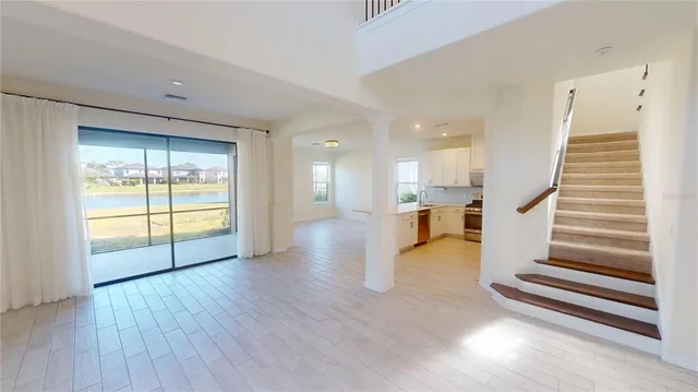 a view of entryway with wooden floor