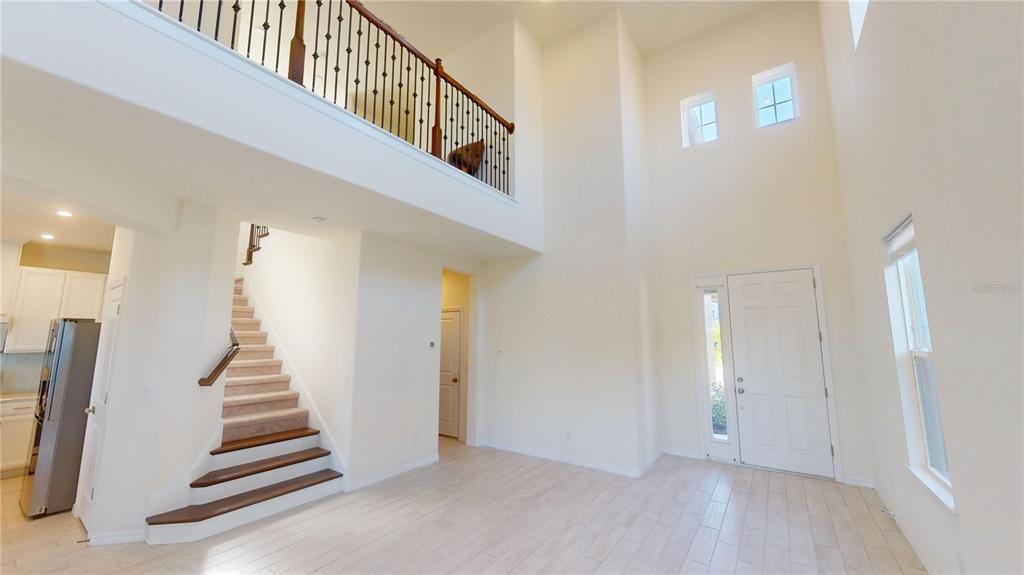 5521 Summit Glen Bradenton, FL 34203 - Photo 21 of 54 a view of entryway with wooden floor