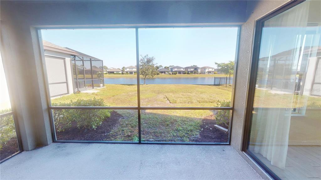 5521 Summit Glen Bradenton, FL 34203 - Photo 27 of 54 a view of a glass door and the window