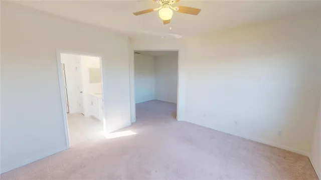 a bathroom with a toilet and a bathtub