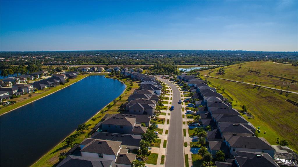 5521 Summit Glen Bradenton, FL 34203 - Photo 54 of 54 an aerial view of residential houses with outdoor space