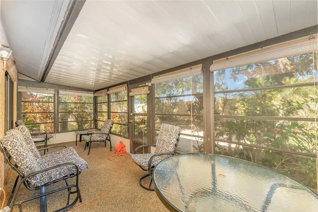 a indoor swimming pool and patio