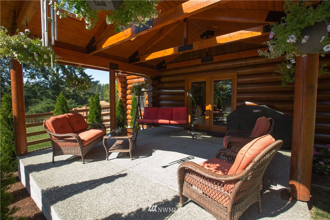 12057 Havekost Road Anacortes, WA 98221 - Photo 13 of 40 a view of a chairs and table in the patio