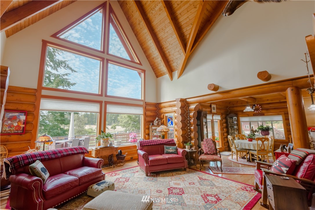 12057 Havekost Road Anacortes, WA 98221 - Photo 18 of 40 a living room with furniture and a large window