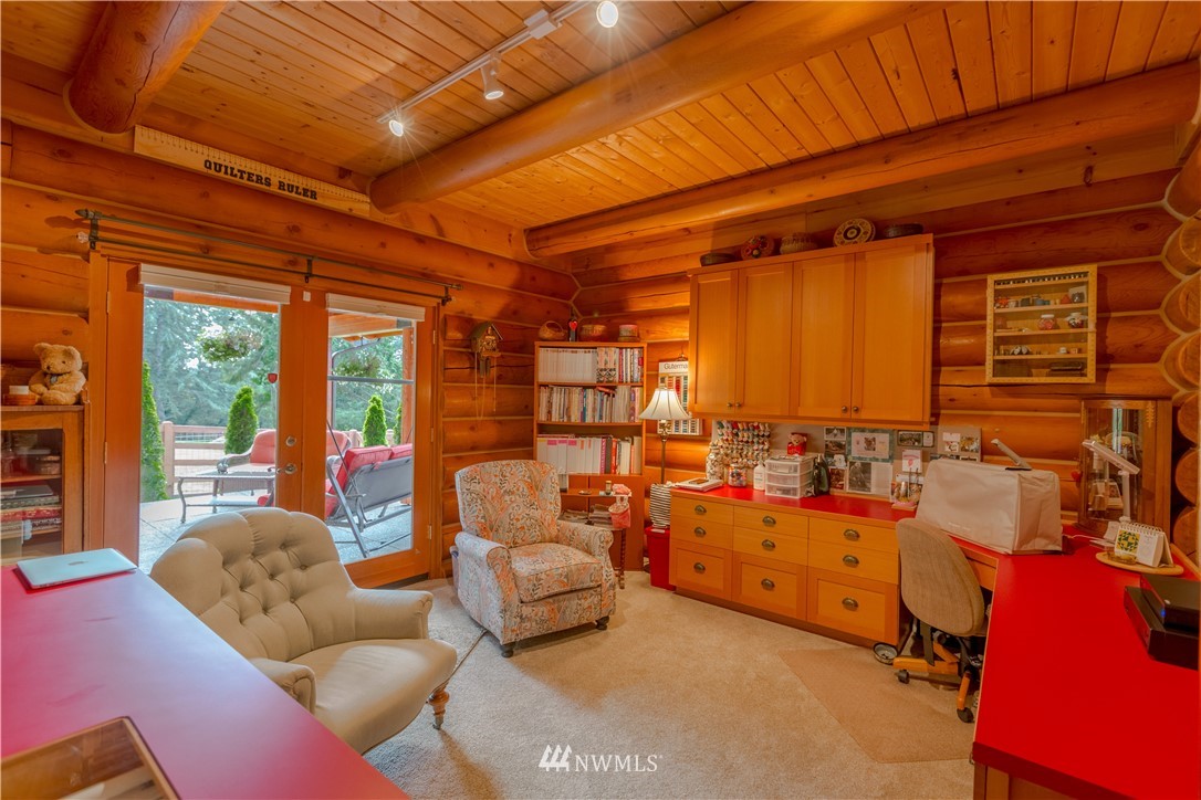 12057 Havekost Road Anacortes, WA 98221 - Photo 27 of 40 a area with furniture and a large window