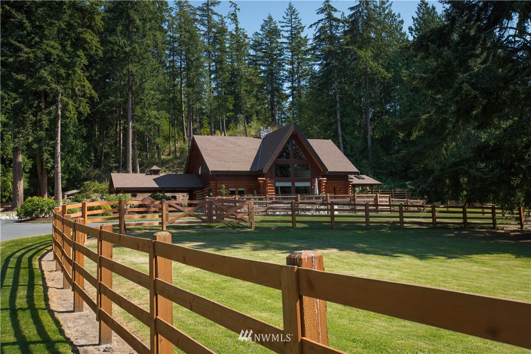 12057 Havekost Road Anacortes, WA 98221 - Photo 4 of 40 a view of a house with yard