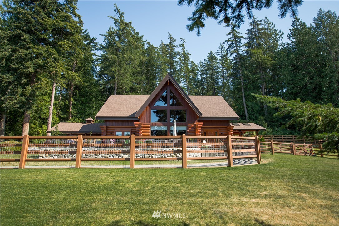 12057 Havekost Road Anacortes, WA 98221 - Photo 5 of 40 a view of a house with a backyard