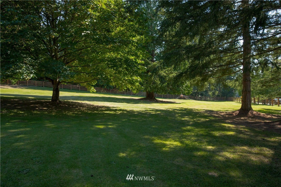 12057 Havekost Road Anacortes, WA 98221 - Photo 10 of 40 a view of outdoor space with deck and green space
