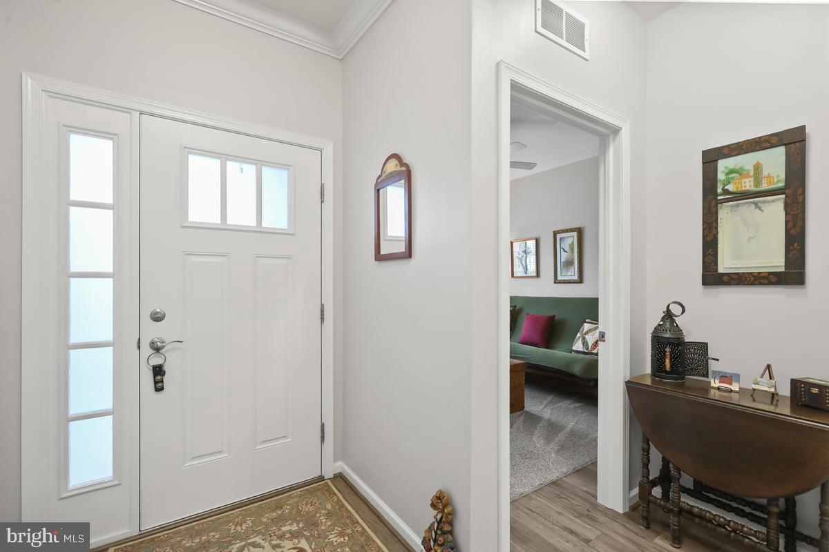 647 Allegiance Drive Lititz, PA 17543 - Photo 13 of 51 a view of a livingroom with lounge chair and a window