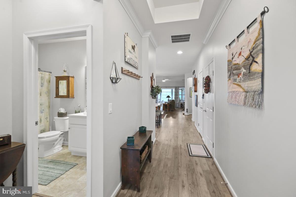 647 Allegiance Drive Lititz, PA 17543 - Photo 51 of 51 a view of a hallway with wooden floor and living room