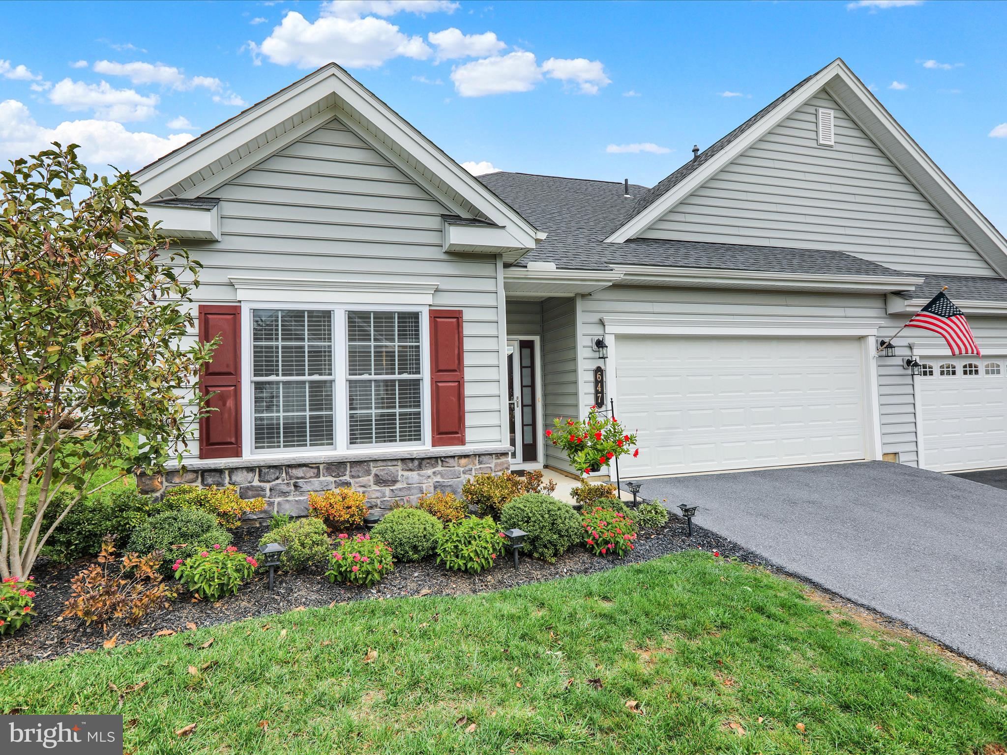 647 Allegiance Drive Lititz, PA 17543 - Photo 2 of 51 a front view of a house with a yard and outdoor seating