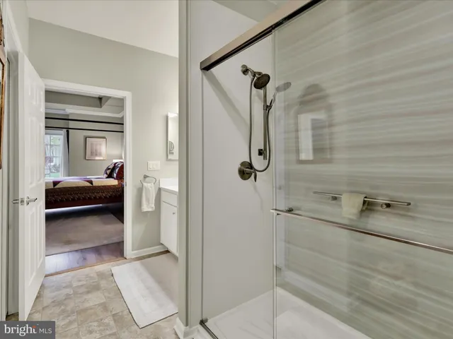 a bed room with a bed and a dresser