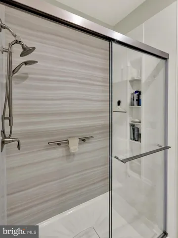 a bedroom with bed and window