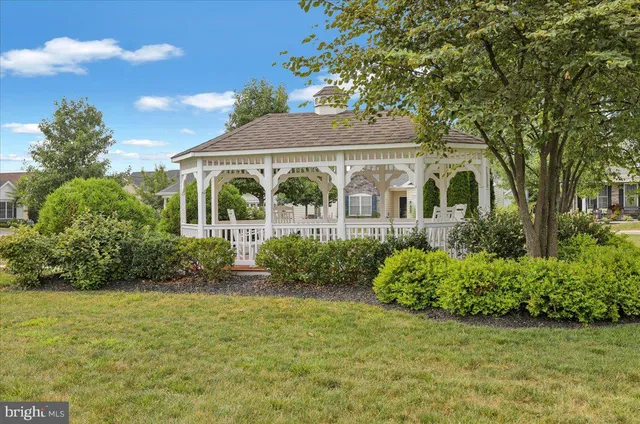 a view of a golf course with a lake