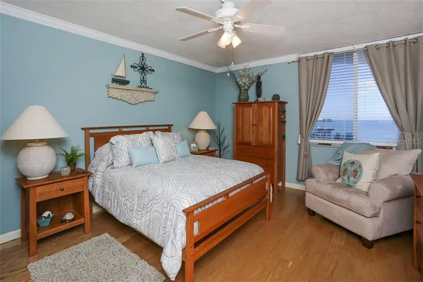 a bed room with a bed and a couch