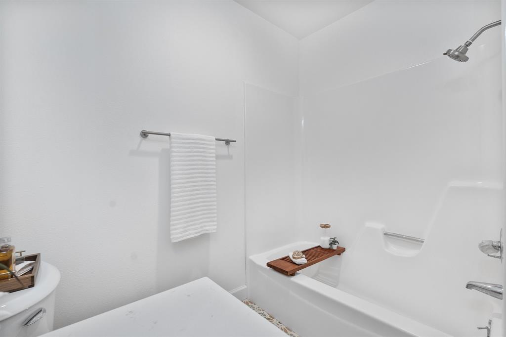 2009 Sandberg Drive, Unit 159 Austin, TX 78752 - Photo 17 of 28 Designer tile for a slash of fun