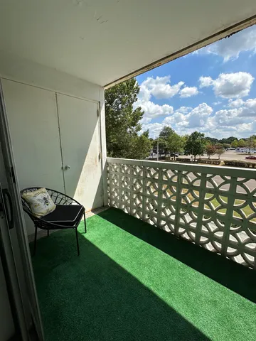 a view of a bench in the garden