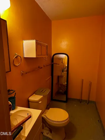 a bathroom with a toilet