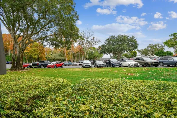 swimming pool view with a seating space