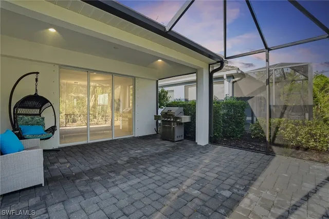 a view of a room with furniture and a yard