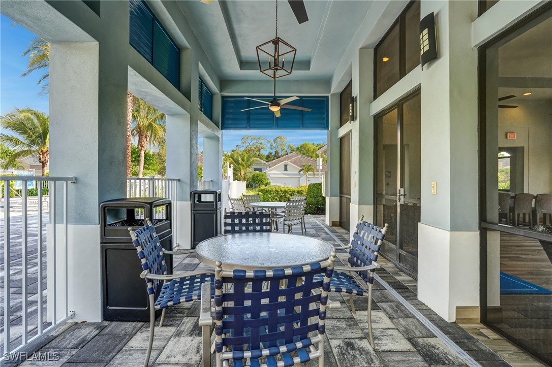 7028 Mistral Way Fort Myers, FL 33966 - Photo 28 of 37 a view of a dining room with furniture window and wooden floor